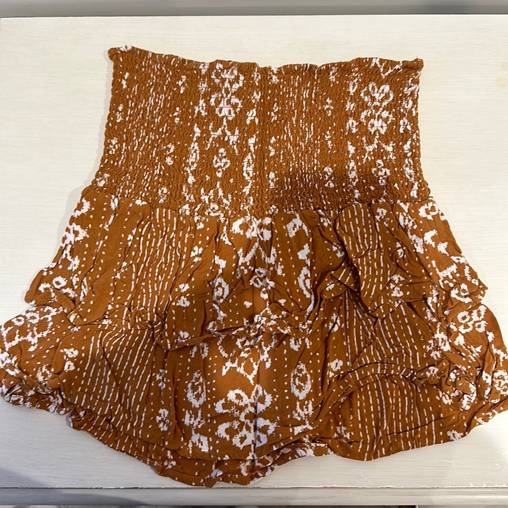 Ripcurl from Nordstrom mini beach skirt in a tan color with a white design